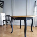 Antique extendable round table with Louis XV style extension