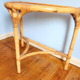 Half-moon rattan console