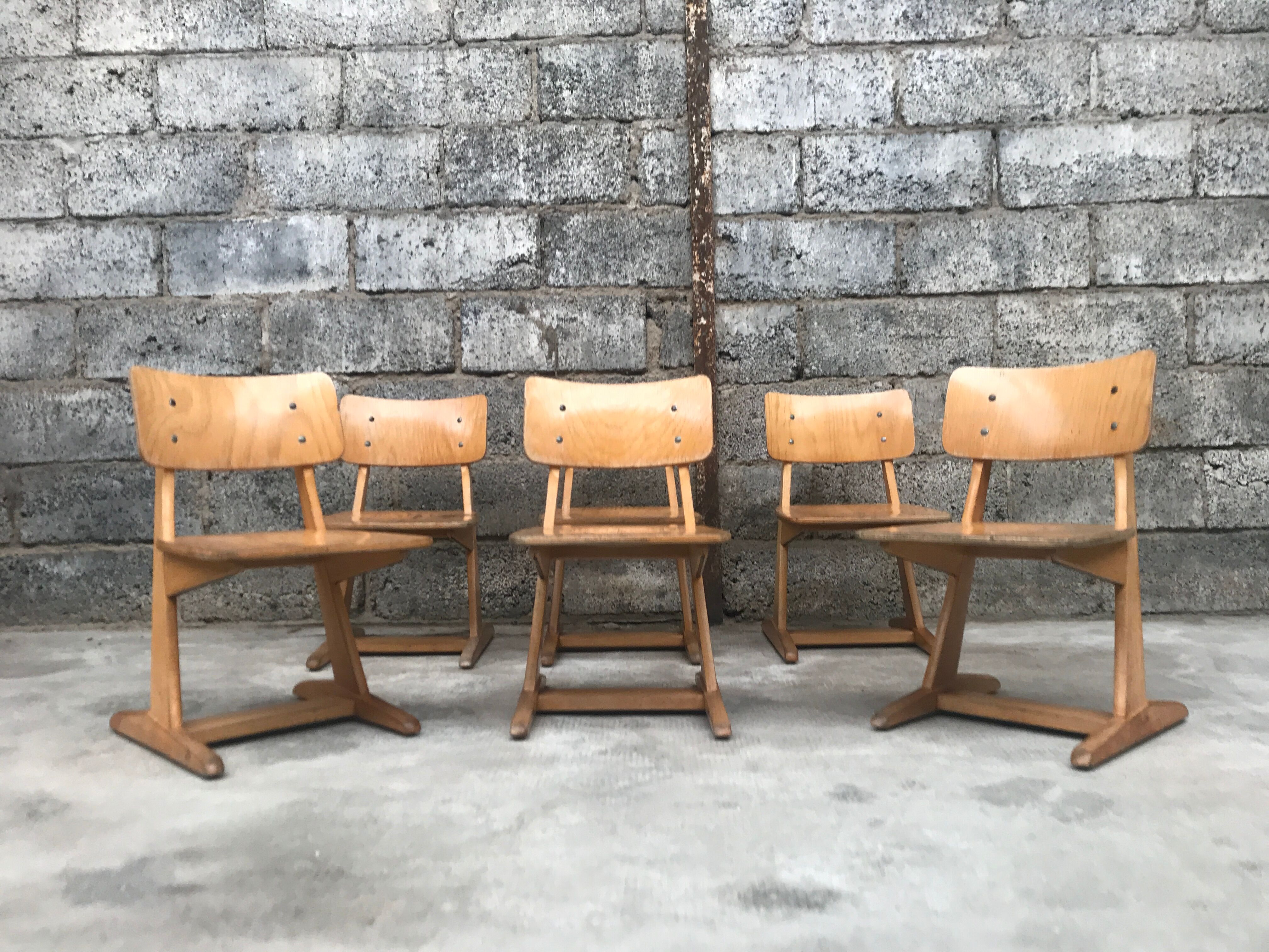 Series of 10 casala children's chairs in vintage light wood