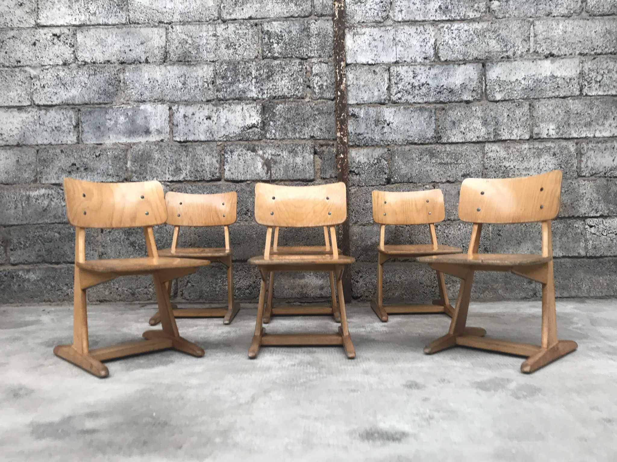 Series of 10 casala children's chairs in vintage light wood