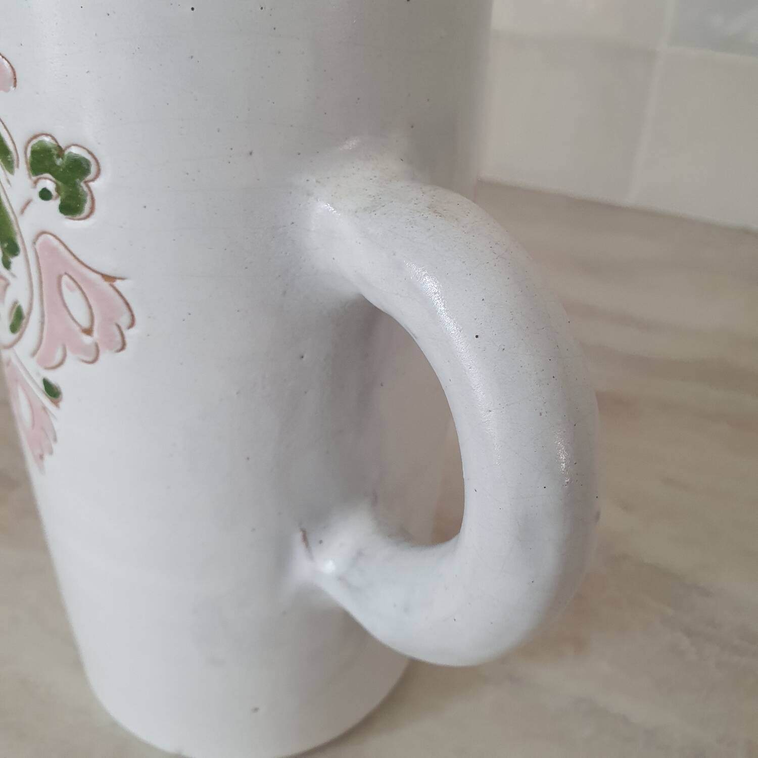 Large white jug with a pink pattern
