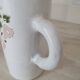 Large white jug with a pink pattern