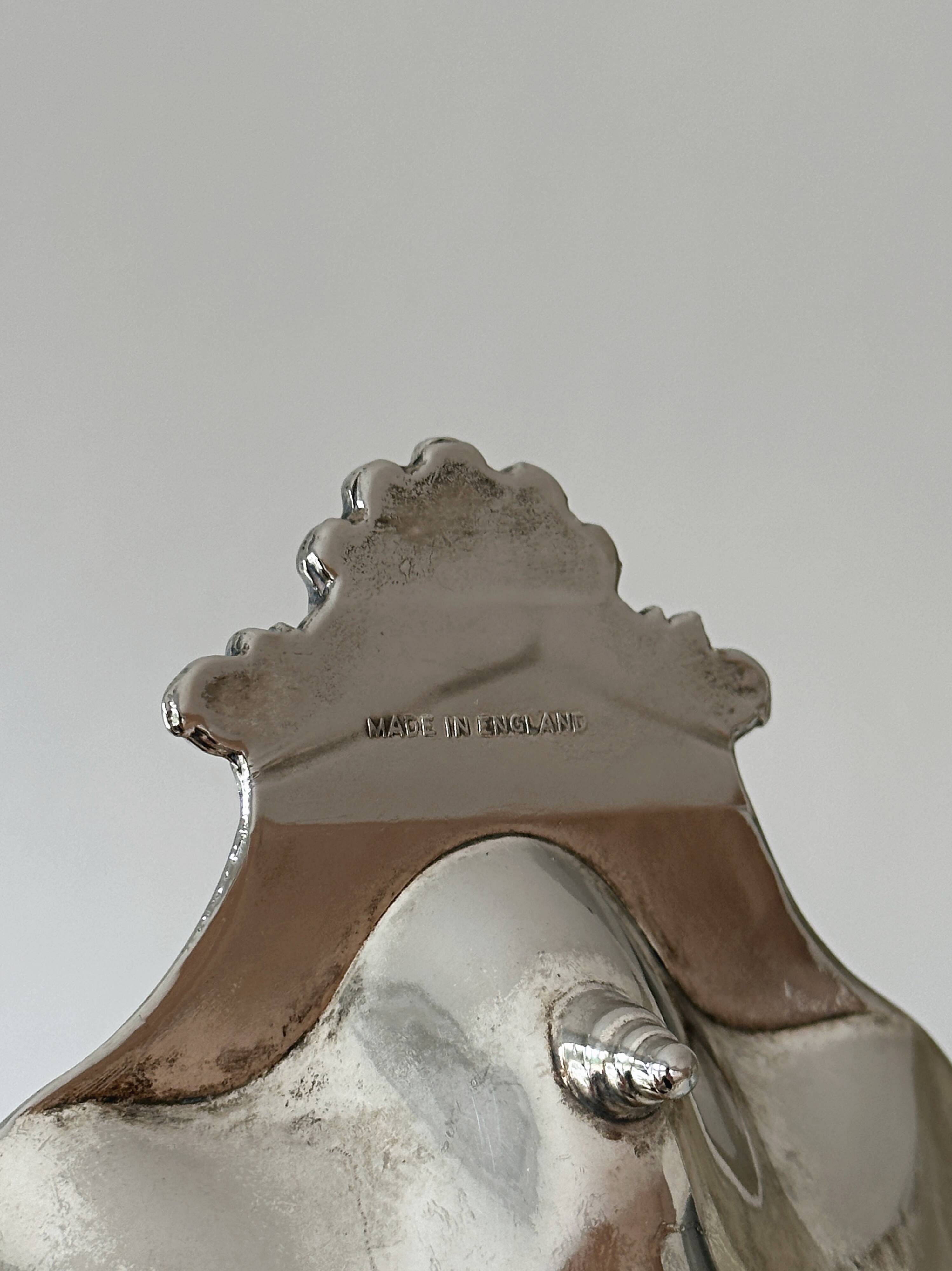 silver shell-shaped dish, shell-shaped pocket tray