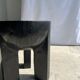 Black mango wood tripod side table with a semi-spherical top, height: 45 cm, diameter: 44 cm.