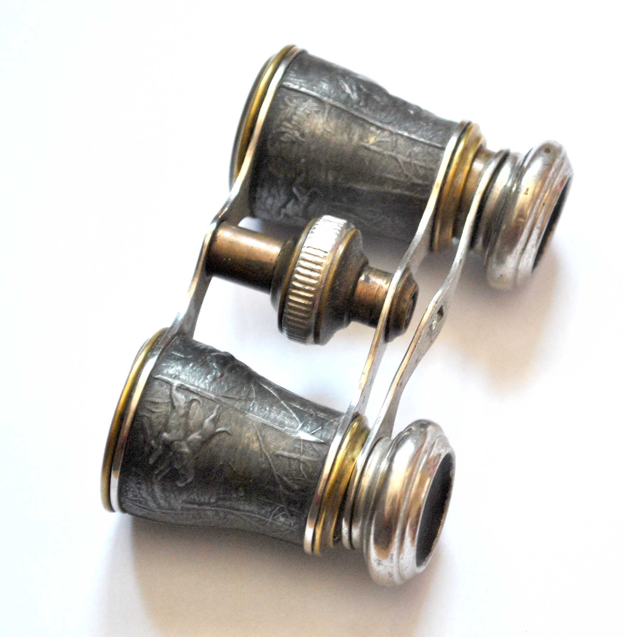 Hunting binoculars or old theater in brass and chrome