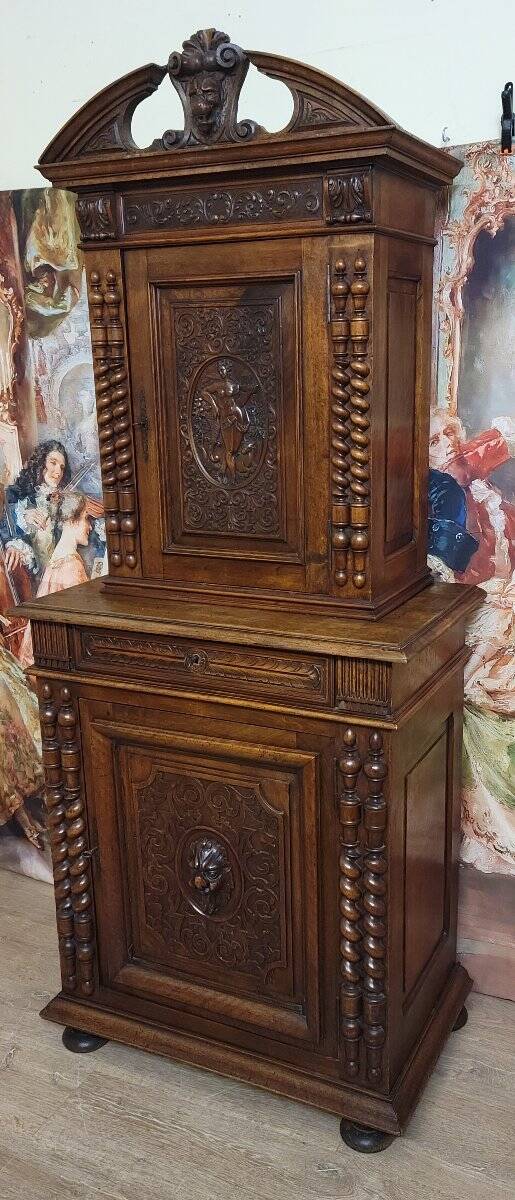 Antique solid walnut piece of furniture, finely carved, in Renaissance style.