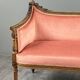 Louis XVI style canapé in carved wood and velvet, 20th century