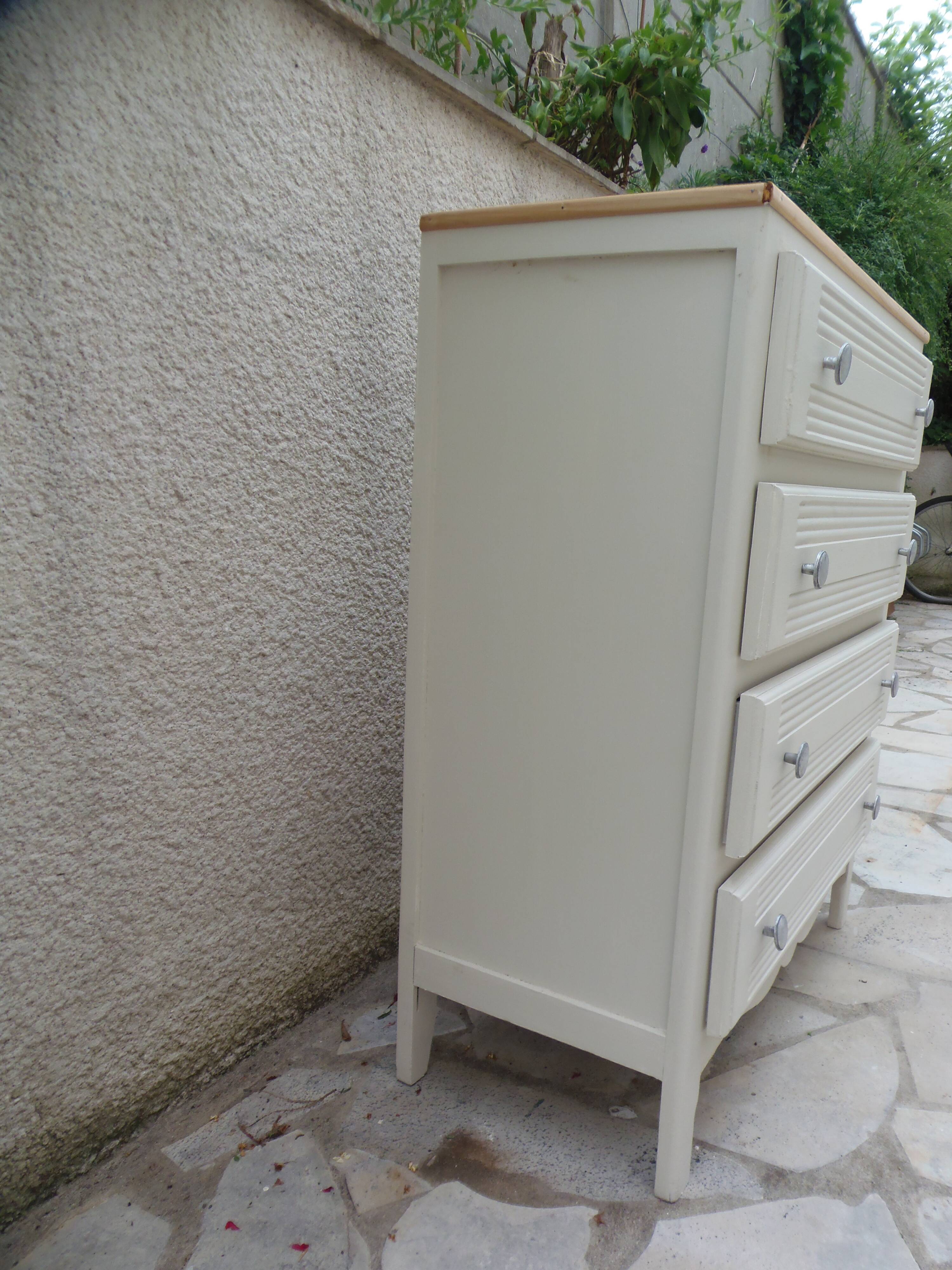 Vintage commode enhanced in beige, wooden top.