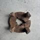Small low circular four-legged stool in organic old teak with cut-out design H2