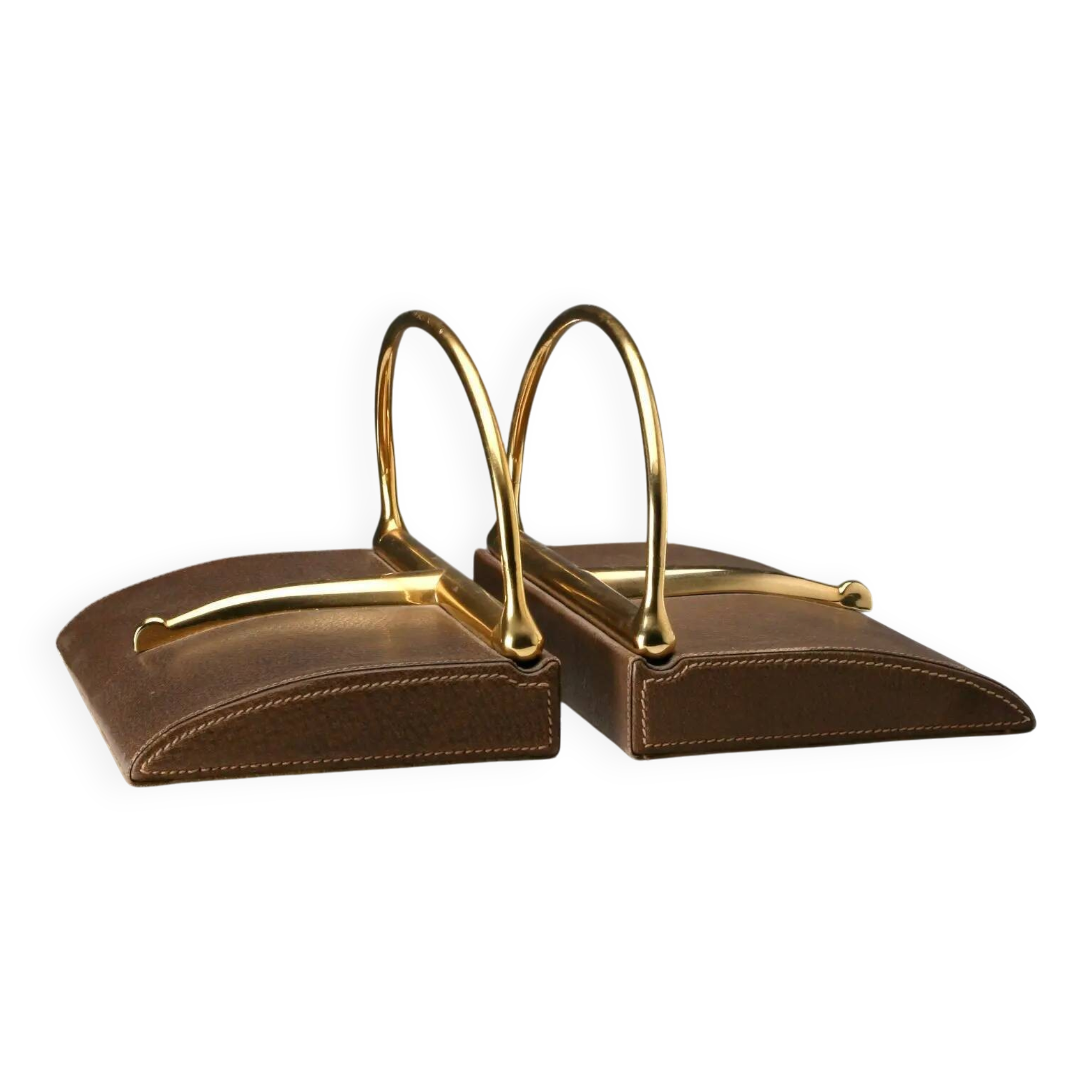 Vintage Gucci bookends in leather and brass, Italy, 1970s.