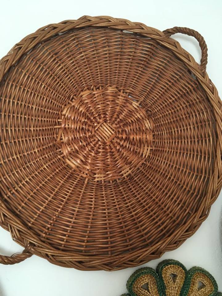 Wall composition of baskets and braided wicker trays