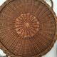 Wall composition of baskets and braided wicker trays