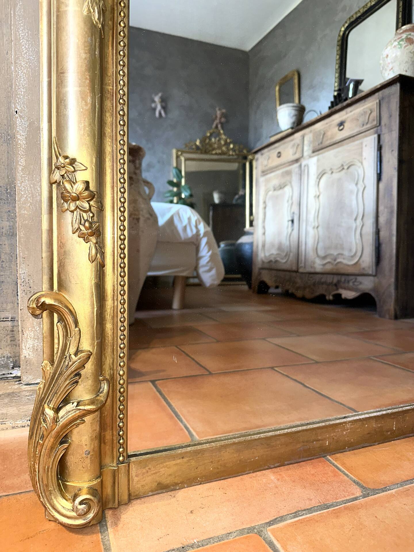 19th-century gilded antique pediment mirror