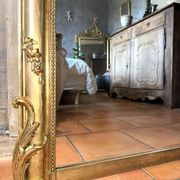 19th-century gilded antique pediment mirror