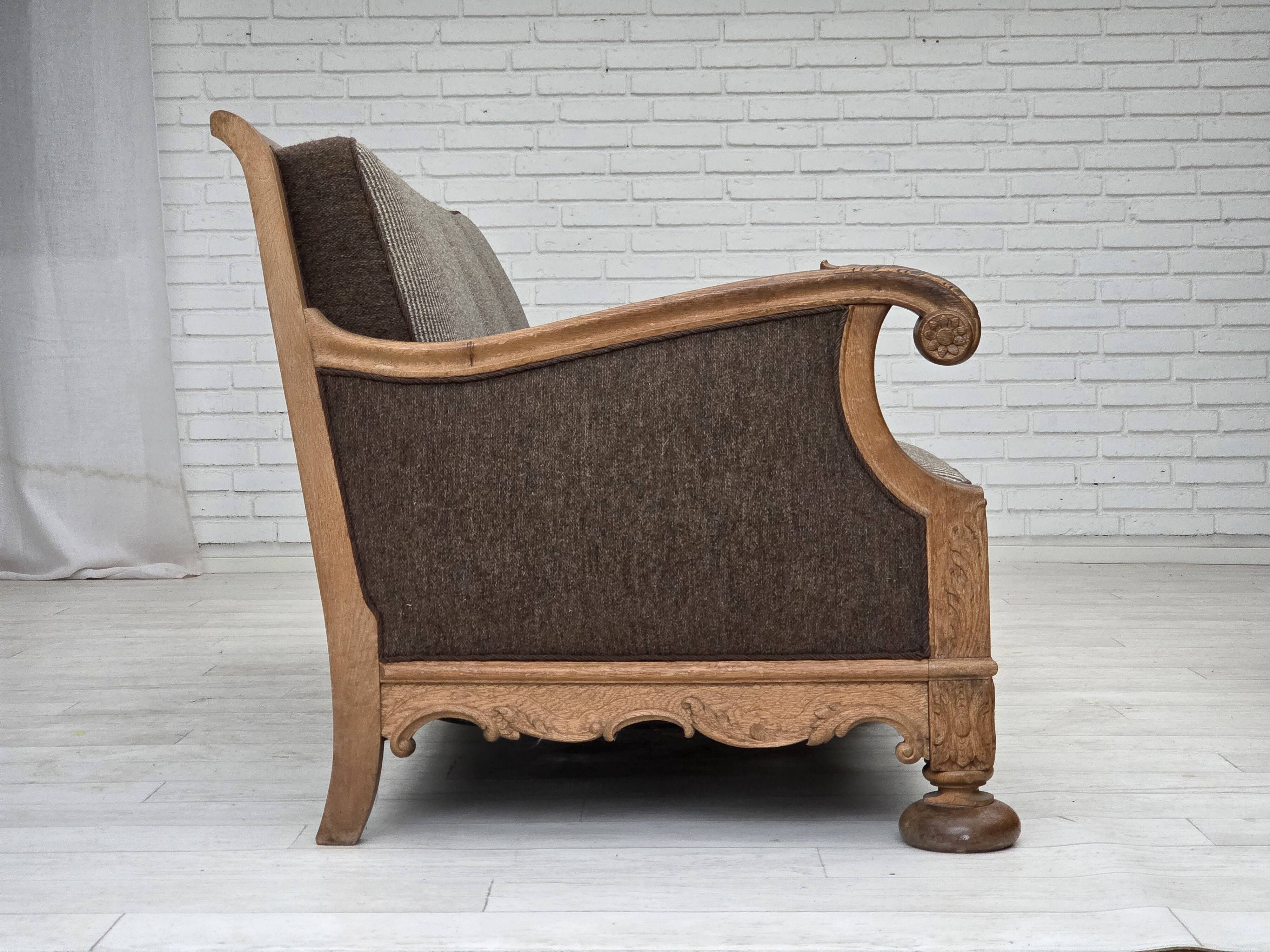 1950s, Danish 3-seater sofa, furniture wool, solid carved oak wood.