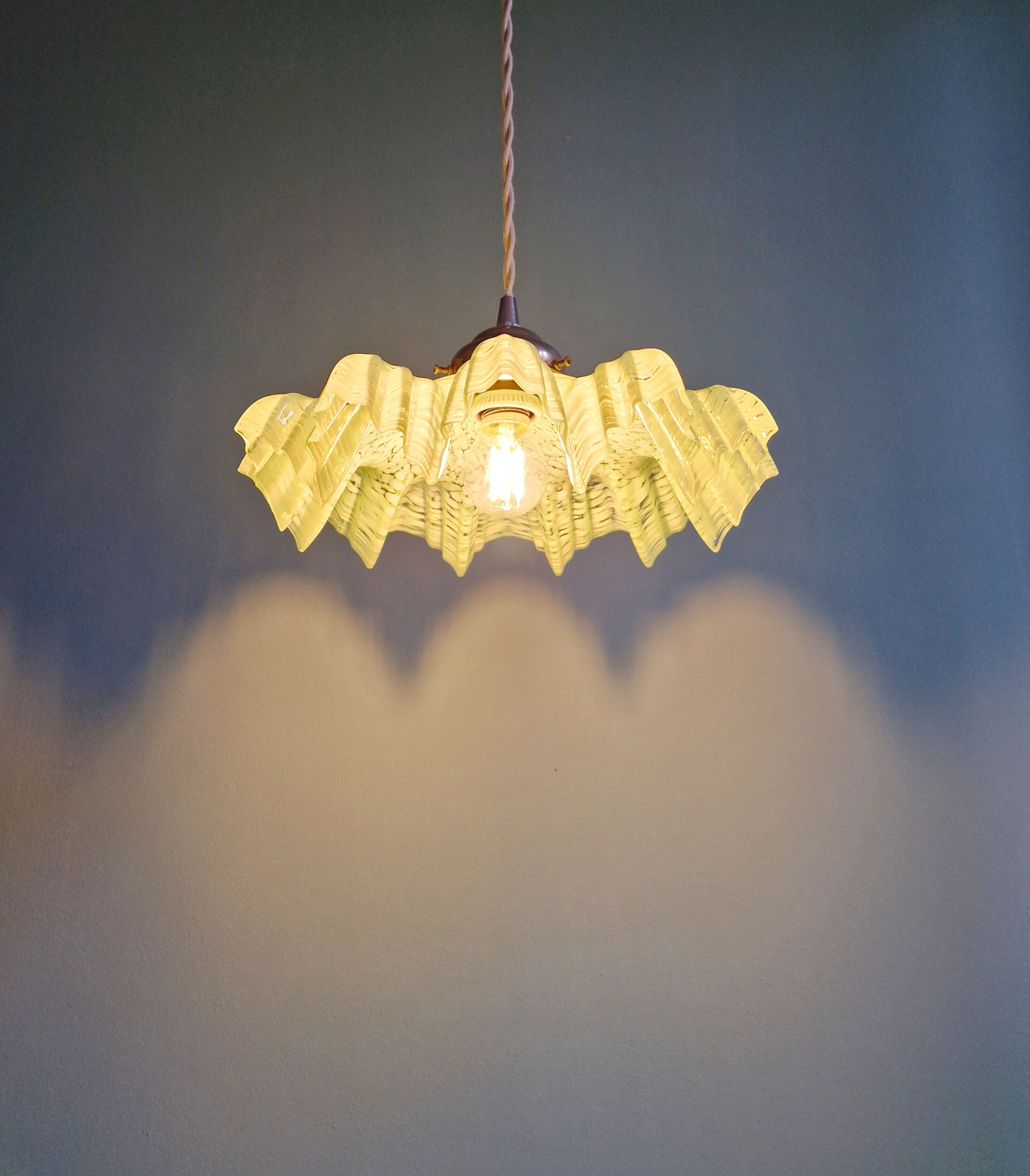 Art Deco pendant light in speckled green and white pleated glass, 1920s-30s.