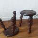 2 round tripod stools
