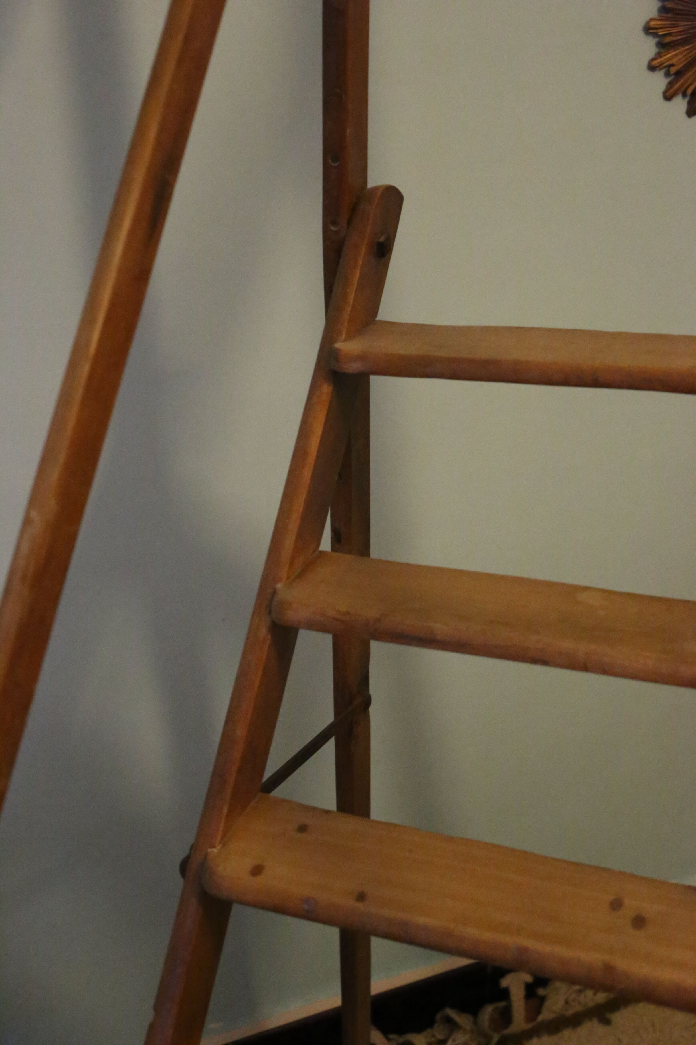 Old wooden stepladder with bodyguards