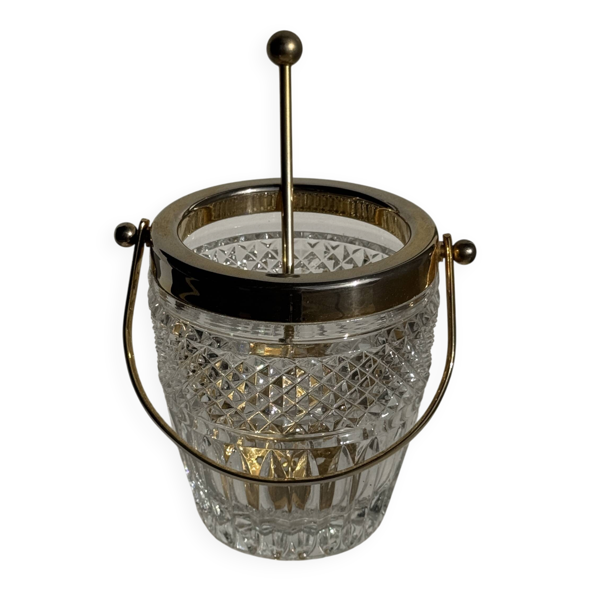 Small golden glass ice bucket with diamond point design and its scoop.