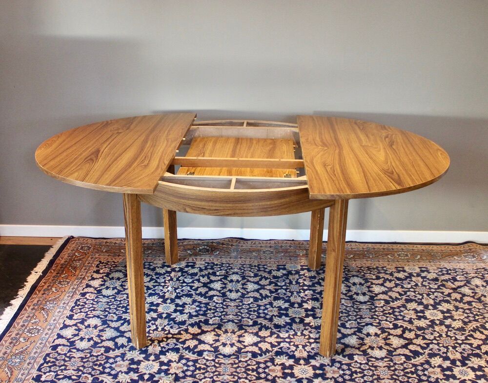 able to eat vintage round in formica imitation teak, with hidden extension, Scandinavian style