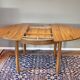 able to eat vintage round in formica imitation teak, with hidden extension, Scandinavian style