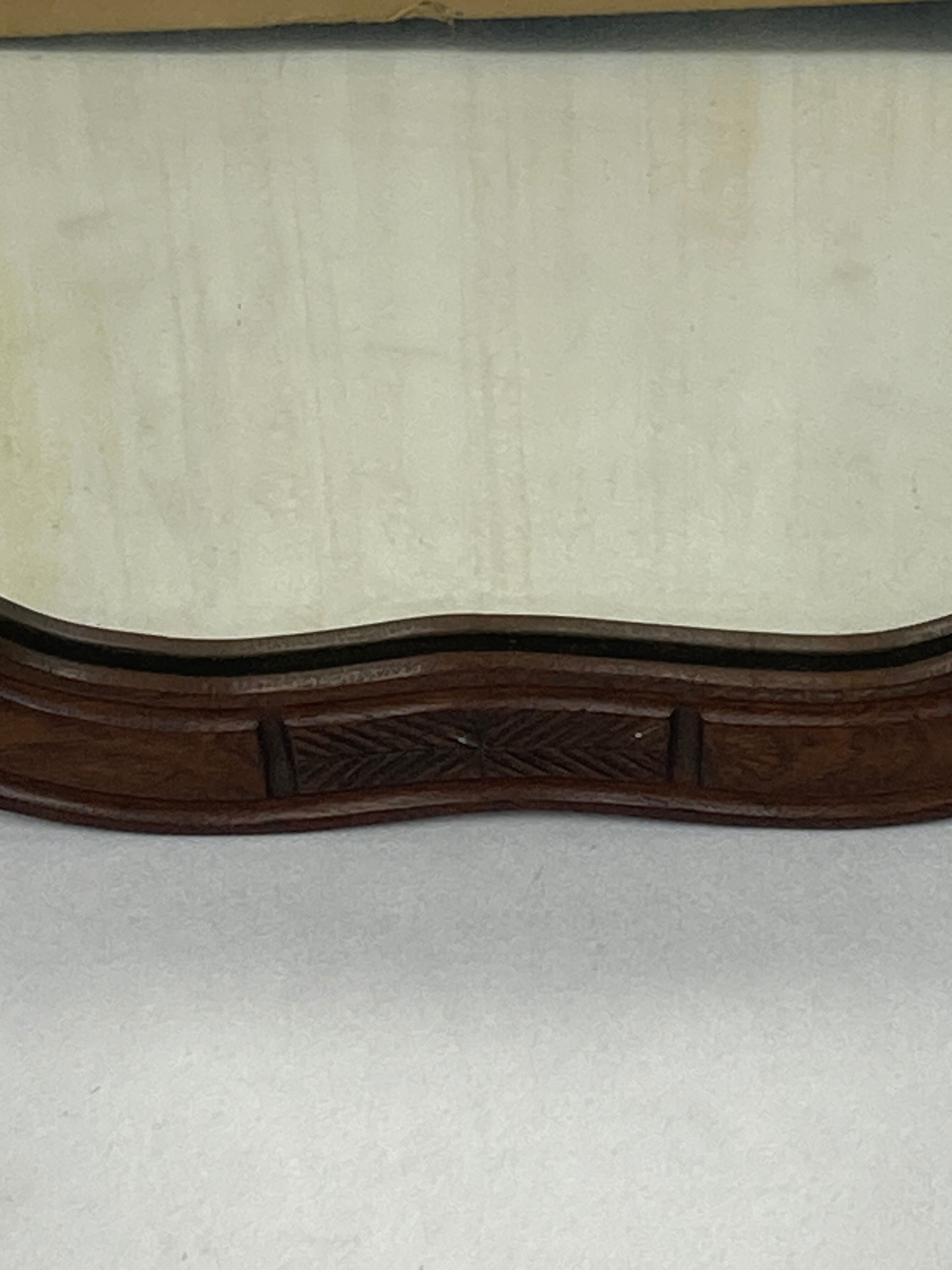 Hand carved wavy curvy vanity mirror, ca 1900