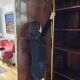 Antique walnut armoire with two doors.