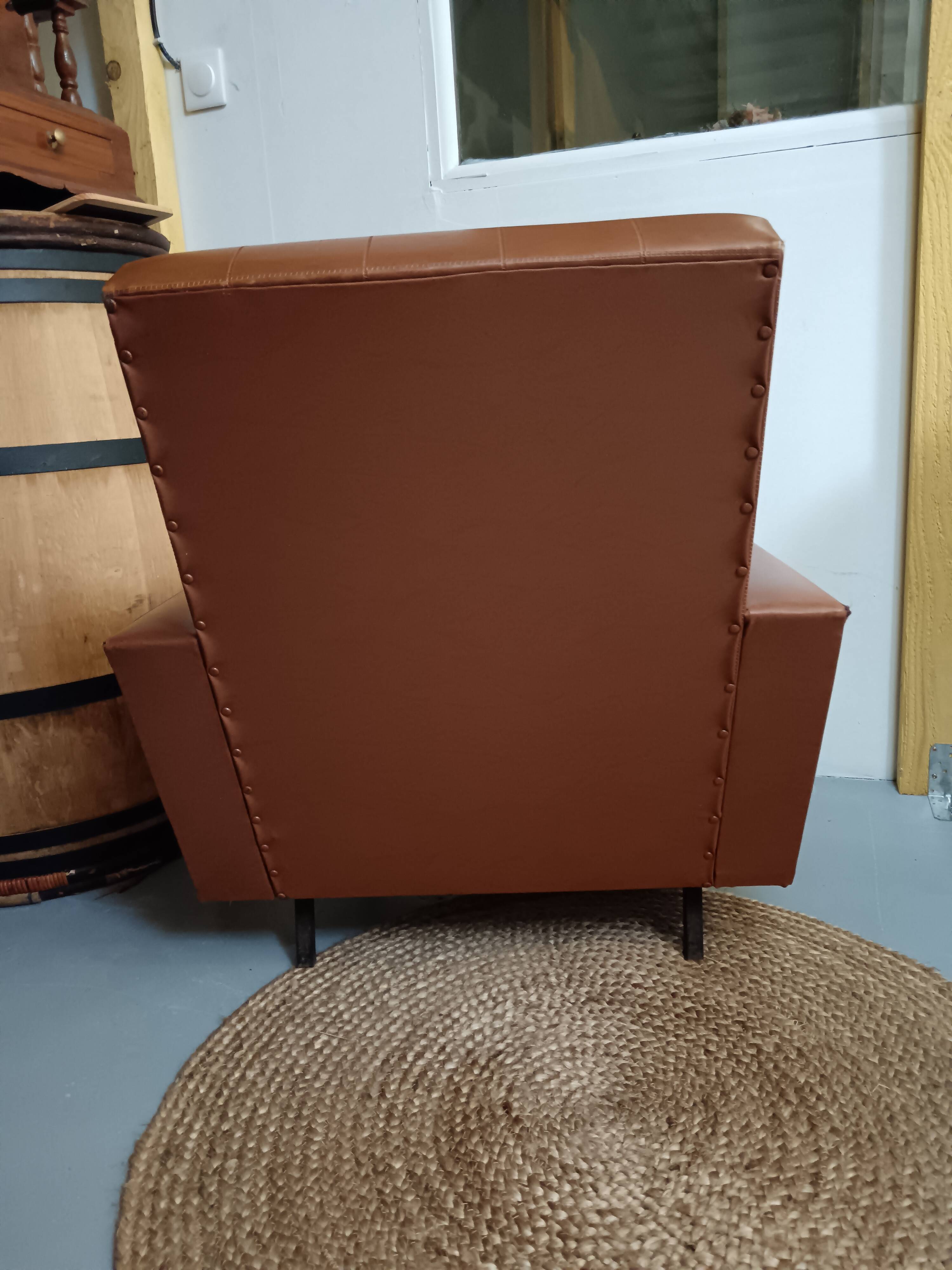 Fauteuil en skaï marron