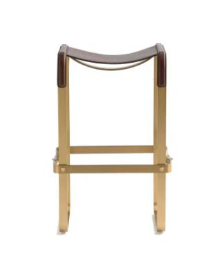 Bar stool in aged brass and brown leather.