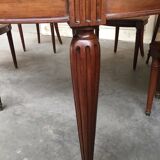 Table and six chairs in the Louis XVI style mahogany