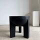 Black mango wood tripod side table with a semi-spherical top, height: 45 cm, diameter: 44 cm.