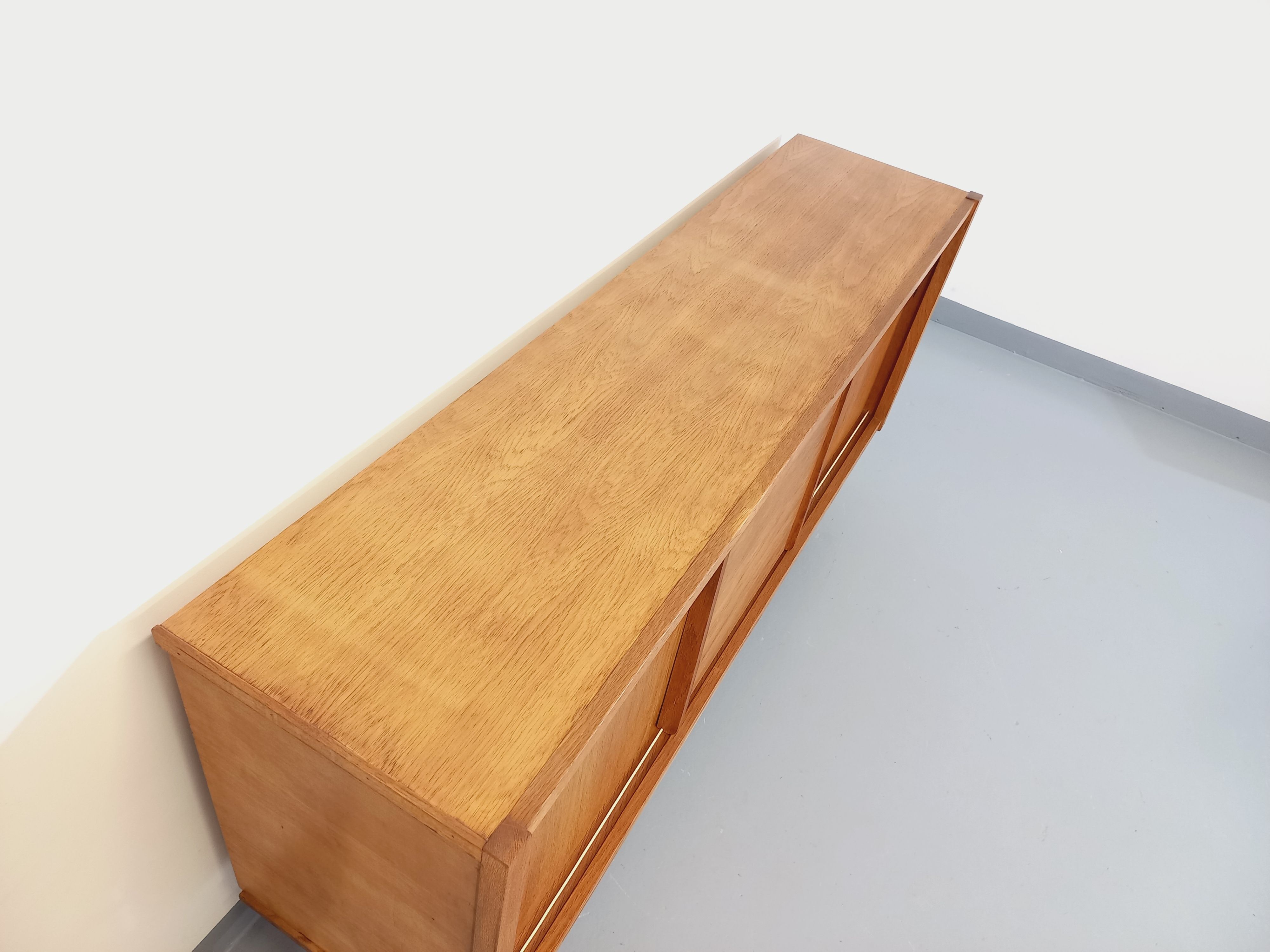 Vintage row in light oak wood from the 60s