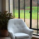 Swivel shell armchair