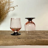 6 small pink glasses with black stems