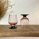 6 small pink glasses with black stems