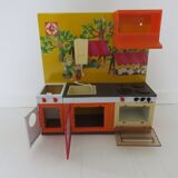 Kitchen doll, child in tole 70s