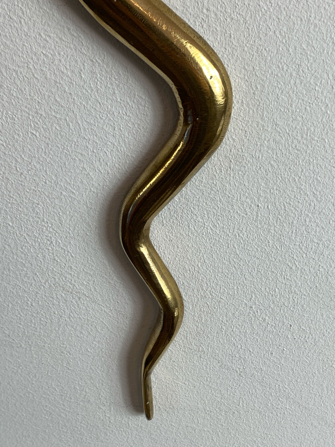 Large brass cobra wall candle holder