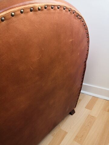 Tawny vintage leather club chair