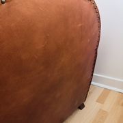 Tawny vintage leather club chair