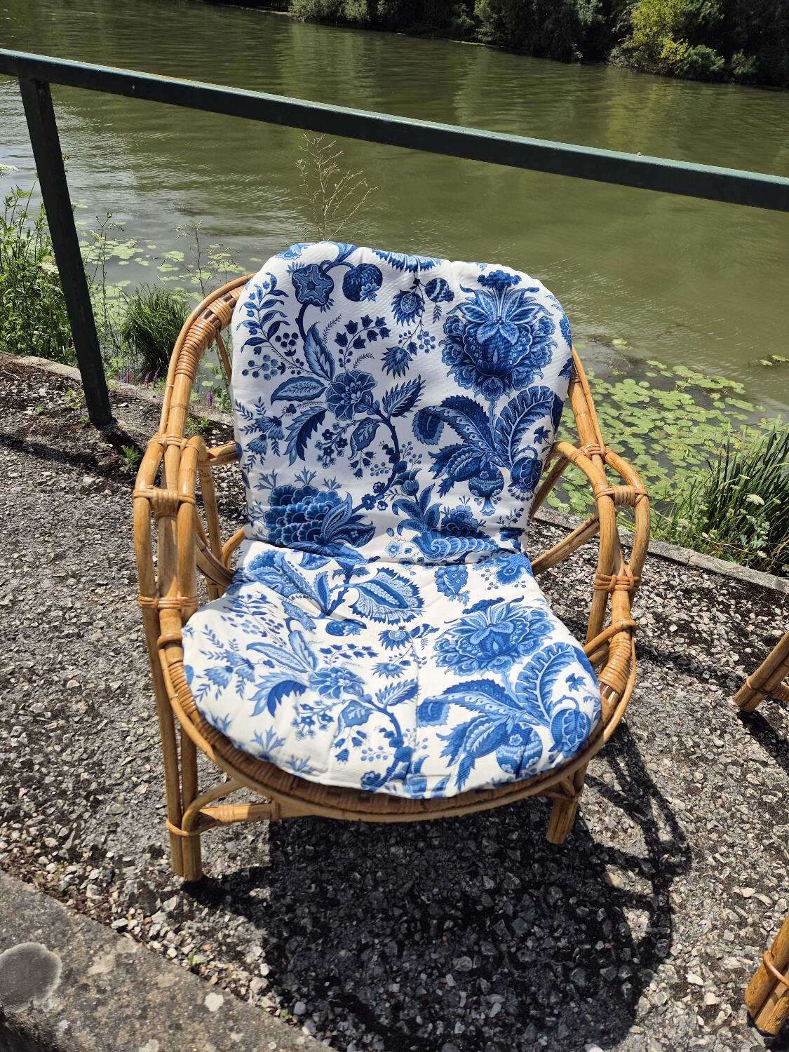 Rattan lounge with two armchairs and a vintage 1950s bench.