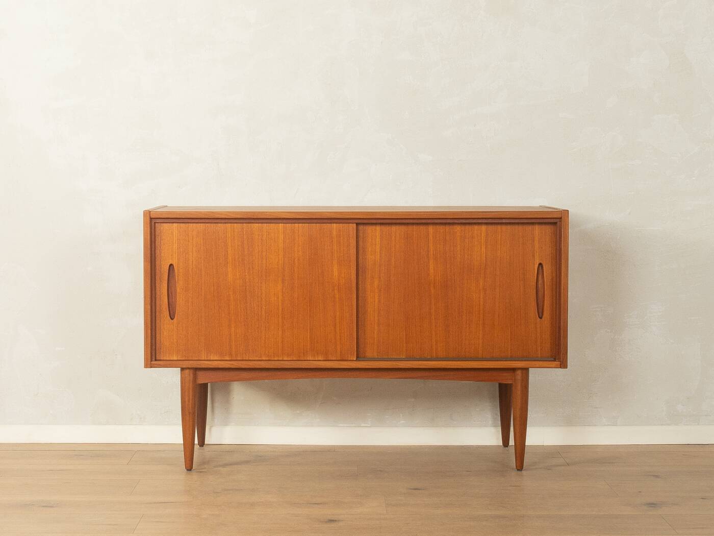 Elegant sideboard from the 1960s, minimalistic with practical storage space