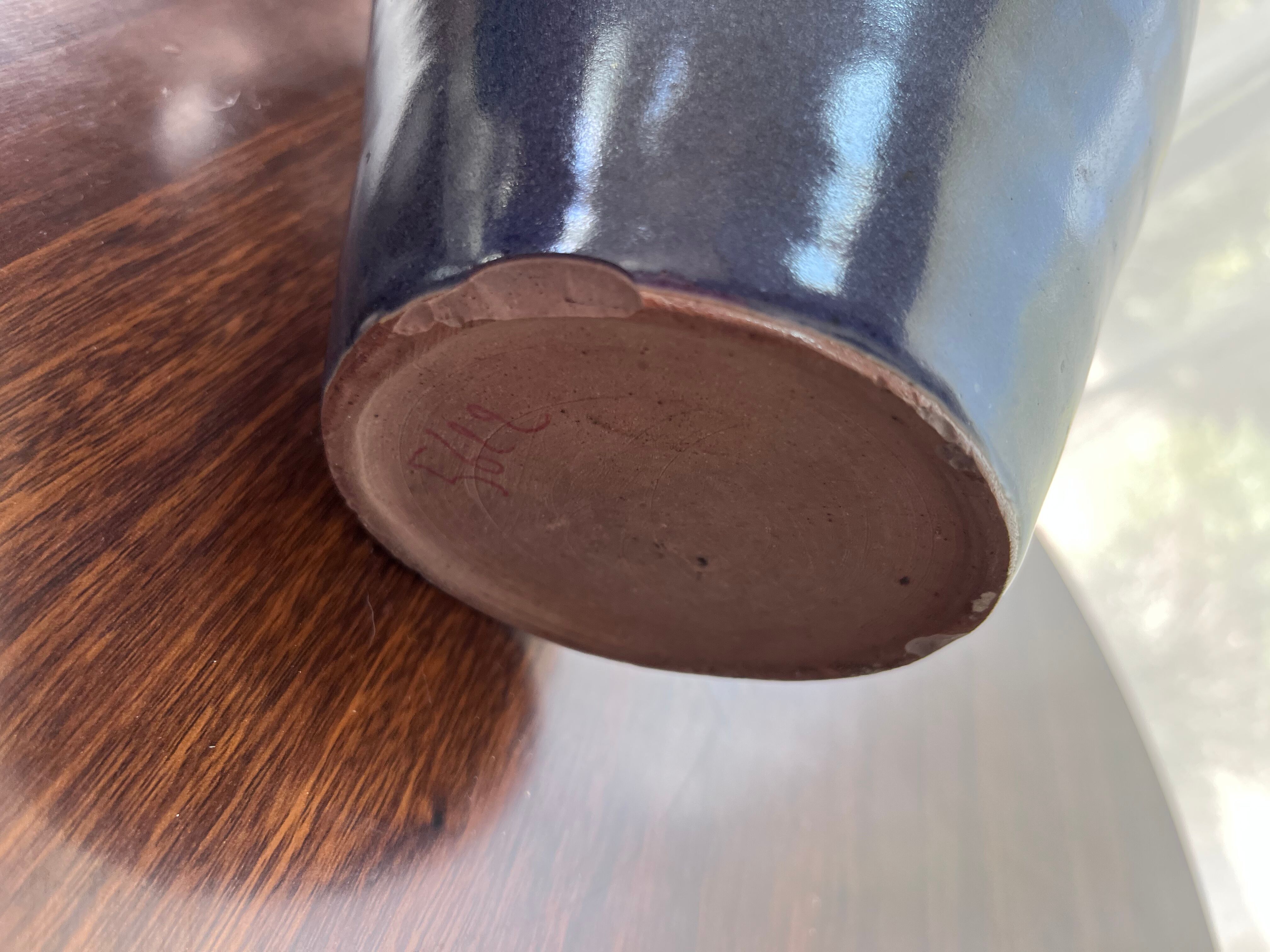 Blue vase with inclusion