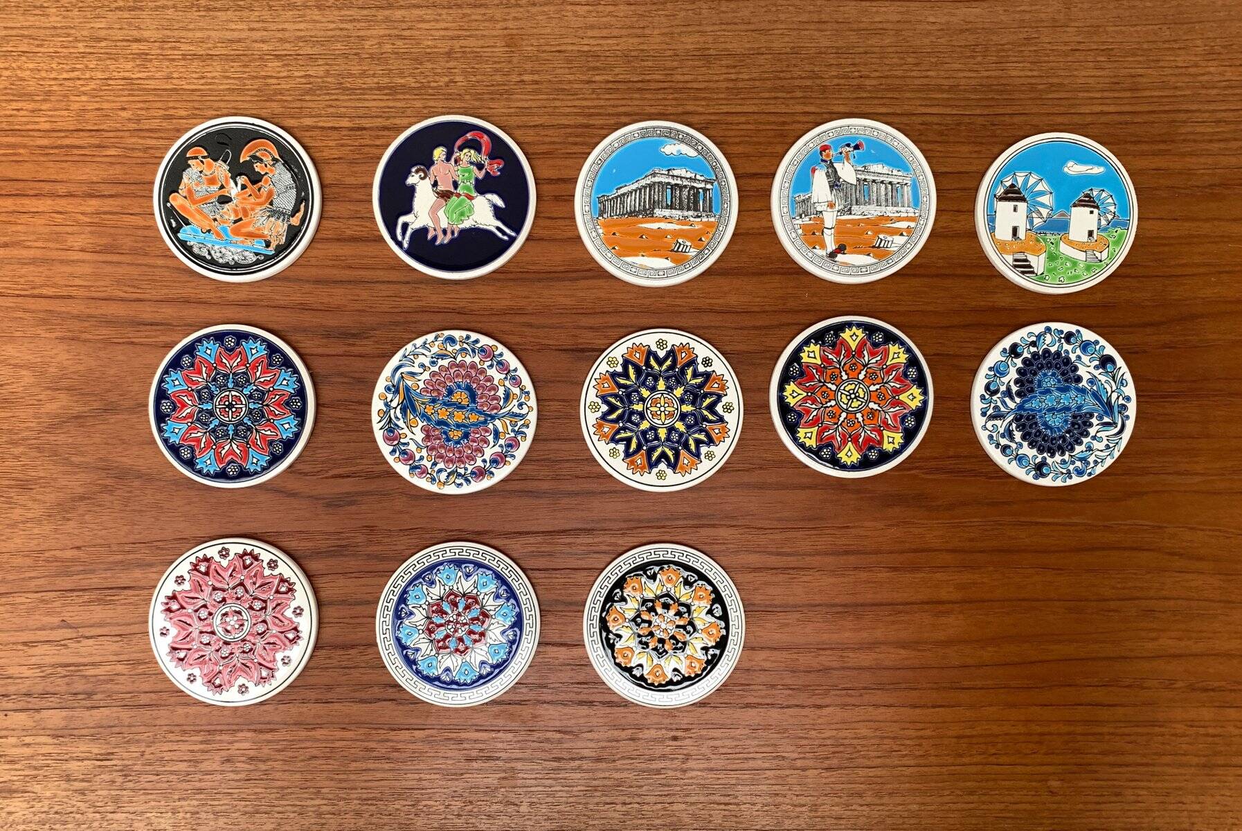 Set of 13 vintage ceramic coasters handmade by Lito Niarchos.