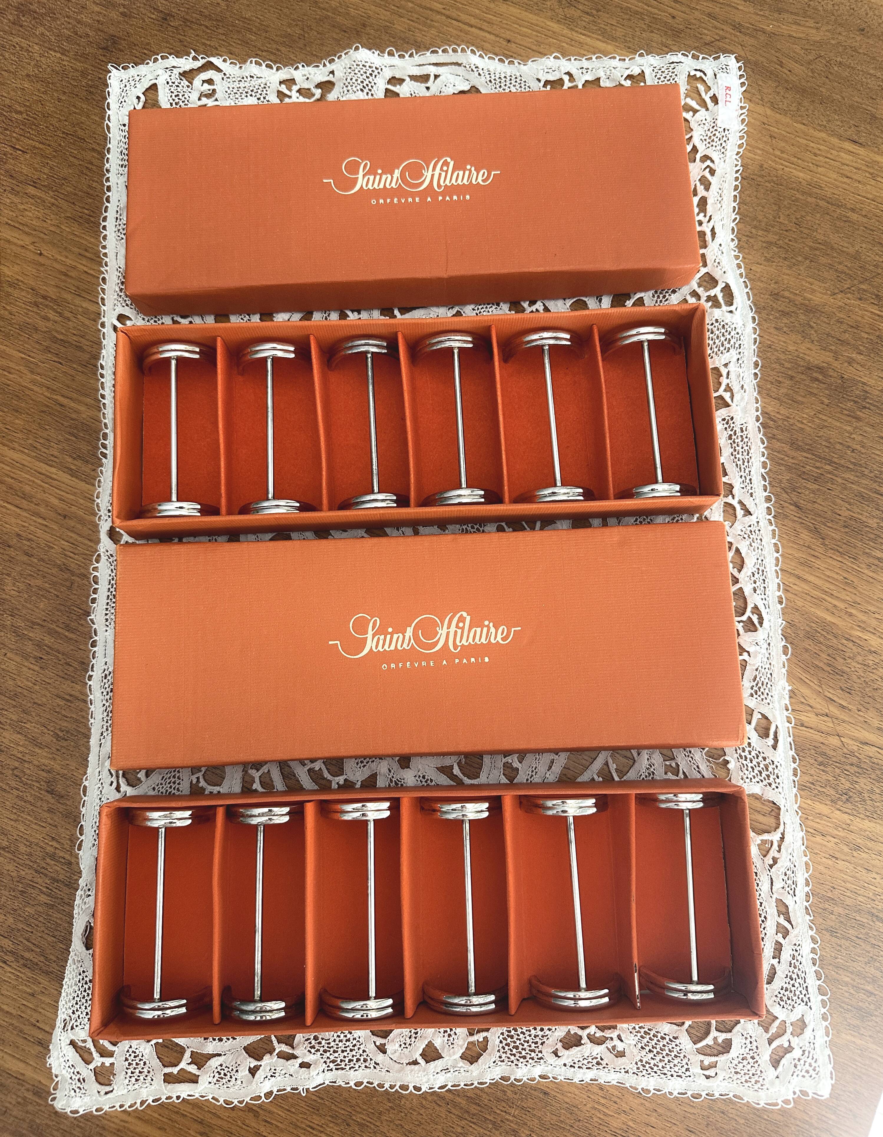 12 porte-couteaux en métal argenté Saint Hilaire modèle Arceaux en coffret