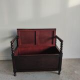 Natural wood chest forming a bench, ringed shoulders