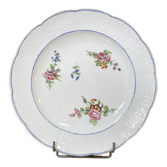 Plate in porcelain of Sèvres with polychrome decoration of flowers of the eighteenth century