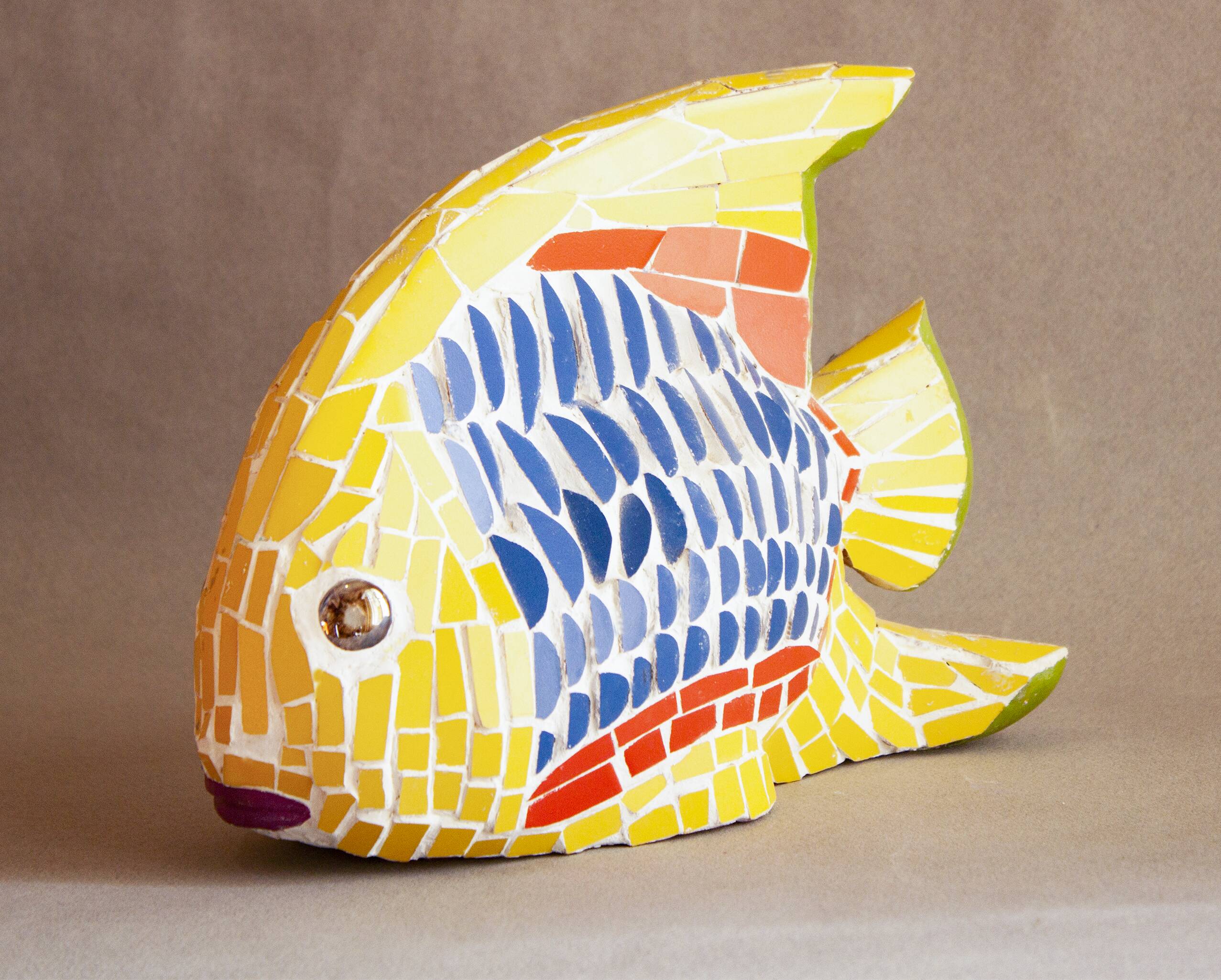 Fish figurine made in trencadis style mosaic. Fish sculpture.