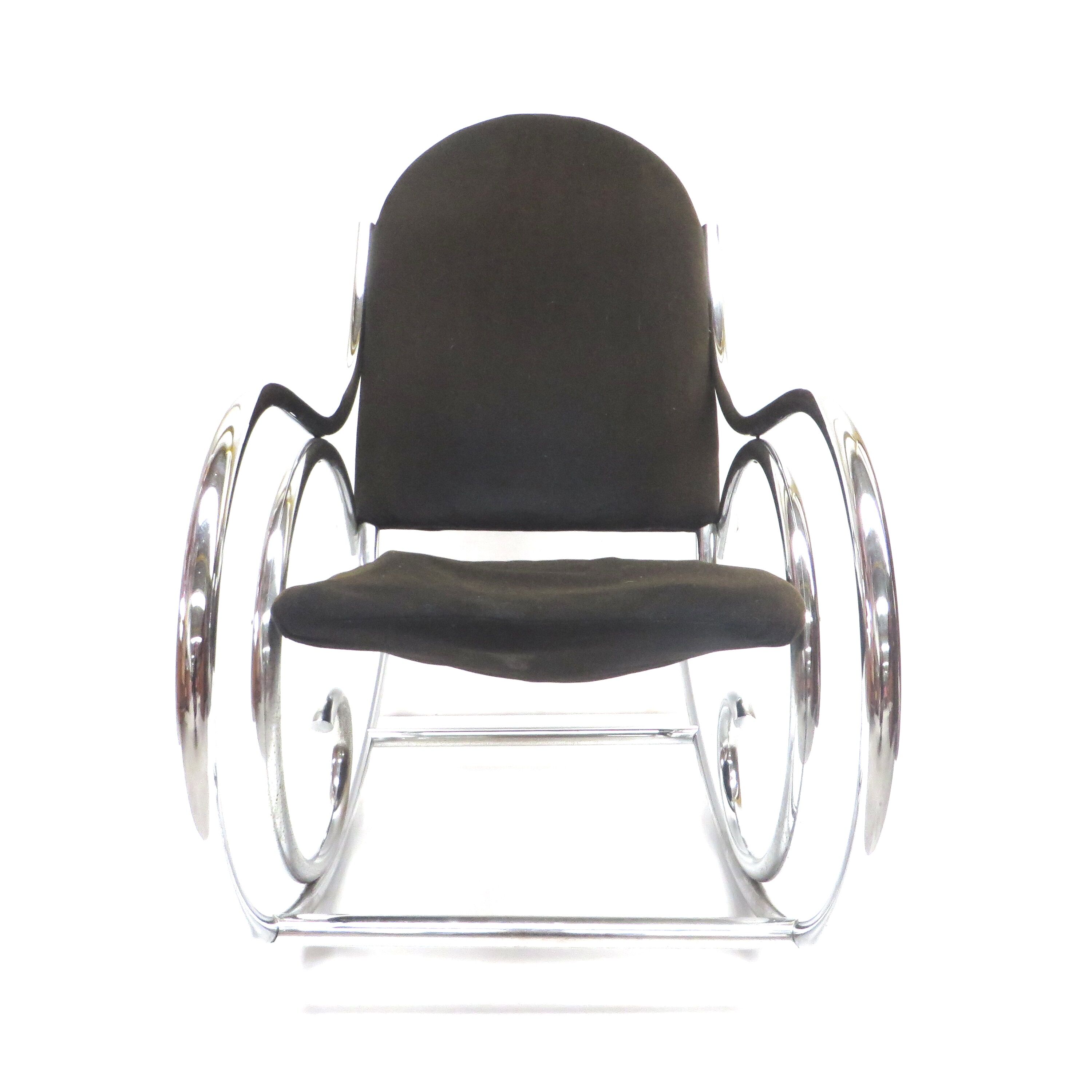 Mid century rocking chair with solid chrome frame and fabric seat from the 70s