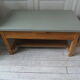 Table basse vintage, piétement, ceinture, tiroir et tablette bois, plateau vert de gris.