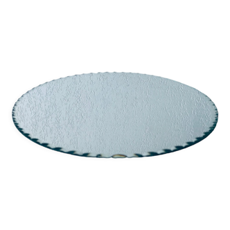 Old round mirror to beveled table